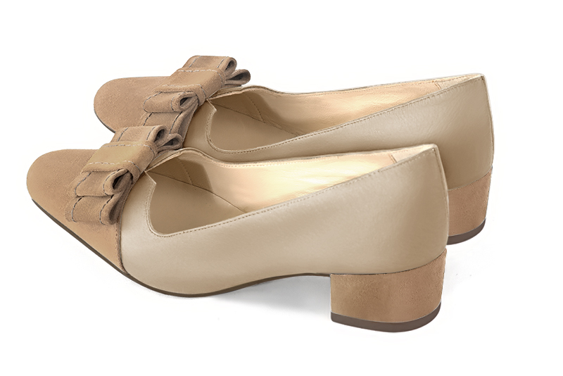 French elegance and refinement for these tan beige dress pumps, with a knot on the front, 
                available in many subtle leather and colour combinations. Possibility to customize with your colors, materials and heels.
With its original cutout, this pretty fitted pump
will render you great services, combining comfort and distinction. 
                Matching clutches for parties, ceremonies and weddings.   
                You can customize these shoes to perfectly match your tastes or needs, and have a unique model.  
                Choice of leathers, colours, knots and heels. 
                Wide range of materials and shades carefully chosen.  
                Rich collection of flat, low, mid and high heels.  
                Small and large shoe sizes - Florence KOOIJMAN